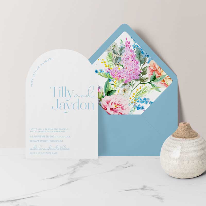 arch diecut shape wedding invitation white and blue floral envelope liner