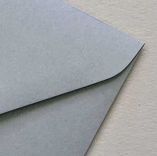 envelope alchemy haze grey closeup