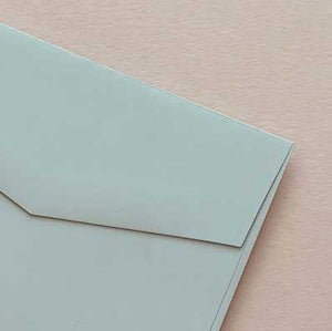 diy invitation paper bloom mint blue closeup