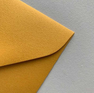 envelope woodland mustard closeup