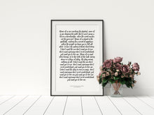 1st year wedding anniversary vow prints in a handwritten script font in a black frame with florals in a vase