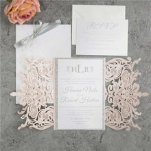 blush pink laser cut invitation with silver glitter open