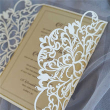ivory Laser-cut wedding invitation close up
