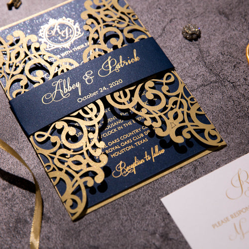 gold foil and navy laser-cut invitation belly band