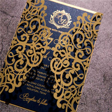 gold foil and navy laser-cut invitation detail