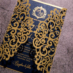 gold foil and navy laser-cut invitation detail