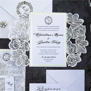 white flower laser cut invitation open