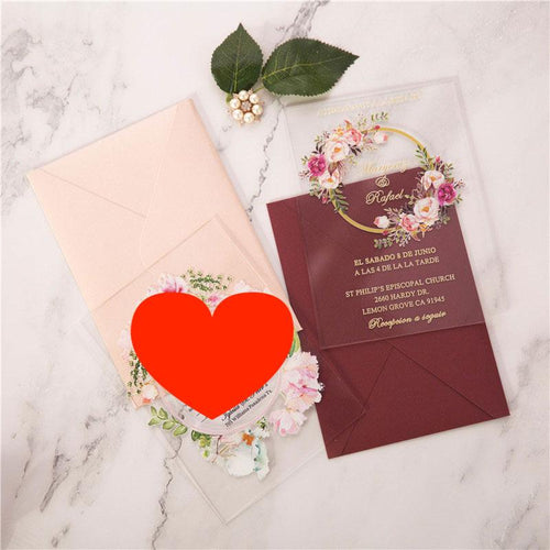 clear acrylic wedding invitation with boho flowers