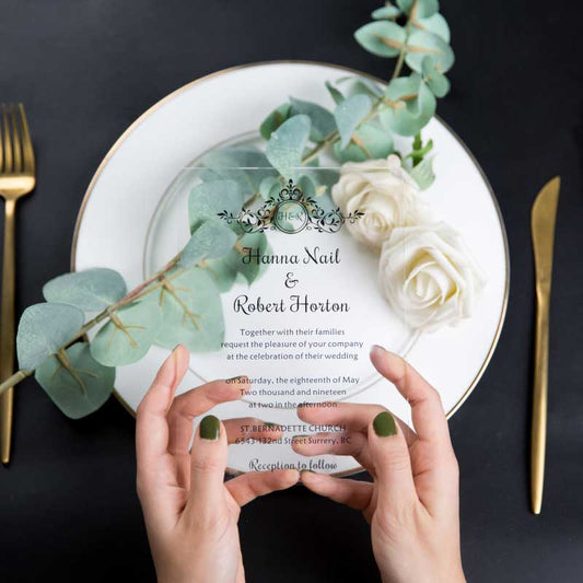 clear acrylic wedding invitation with monogram in black