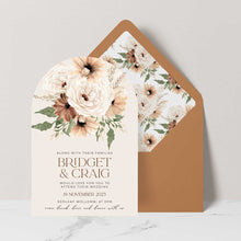 Bohemian Elegance wedding invitation in arch shape featuring cream and brown flowers with greenery set with terracotta coloured envelope and matching floral liner