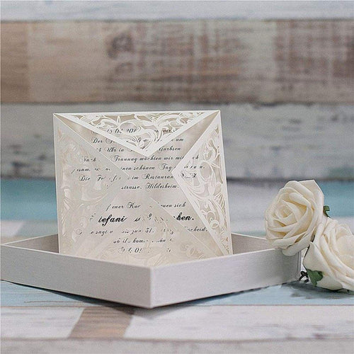 white Laser-cut wedding invitation