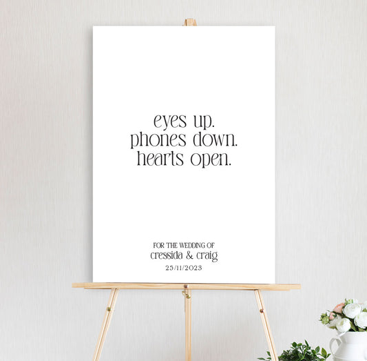 eyes up phones down unplugged wedding sign