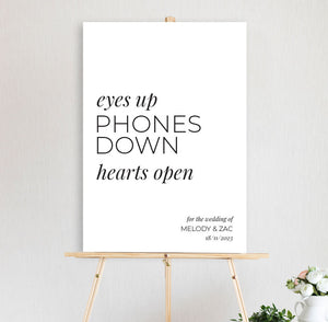 eyes up phones down unplugged wedding sign