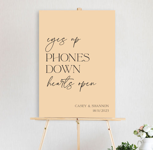 eyes up phones down unplugged wedding sign
