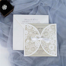 Laser-cut Wedding Invitation featuring a doily floral design oined in the middle, embellished with a white bow