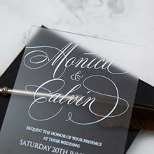 white frosted acrylic wedding invitation closeup