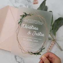 frosted weddingg invitation with greenery and geometric border with blush pink envelope
