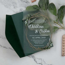 frosted weddingg invitation with greenery and geometric border with green envelope