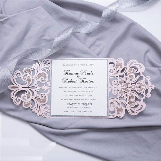 Laser-cut Gate Fold Wedding Invitation with swirl in blush pink with silver glitter backing card