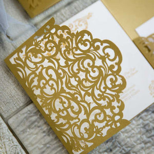 gold laser-cut wedding invitation detail