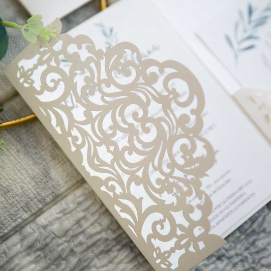 ivory laser-cut pocket invitation detail