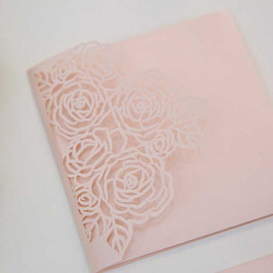 blush pink rose laser-cut invitation side