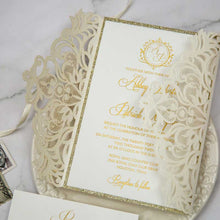 ivory laser-cut invitation gold foil detail