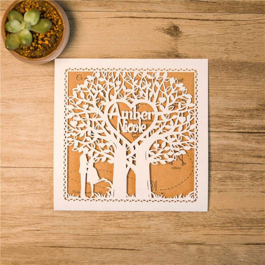 Laser-cut sleeve with personalised names in tree branches