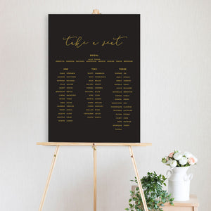 black and gold take a seat table seating chart