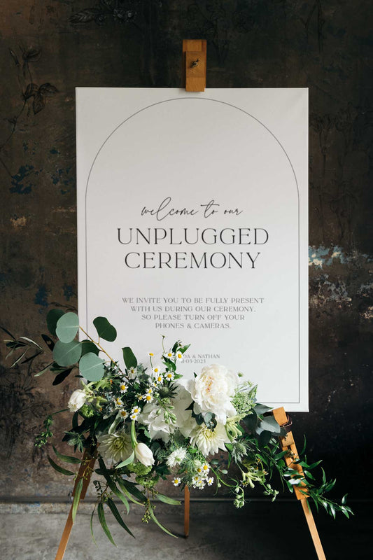 modern black and white arch unplugged ceremony sign