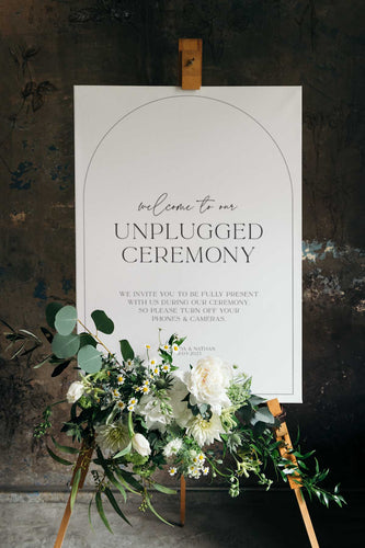 modern black and white arch unplugged ceremony sign
