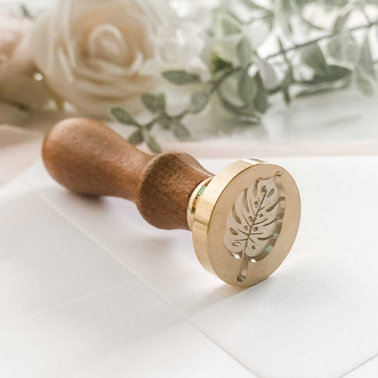 wax stamp monstera leaf closeup