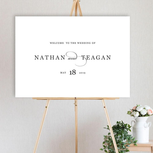 classic font welcome sign for wedding, engagement or birthday party, sitting on a timber easel