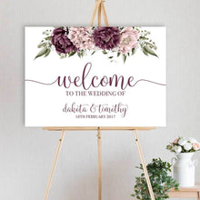 beautiful floral welcome sign Blushing Marsala Peonie featuring burgundy and dusty pink peonie florals for wedding, engagement party or birthday sitting on timber easel