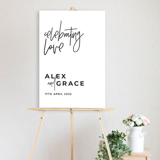 black and white celebrating love welcome sign on timber easel wedding, engagement, birthday 