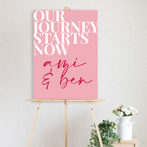 pink and red our journey welcome sign