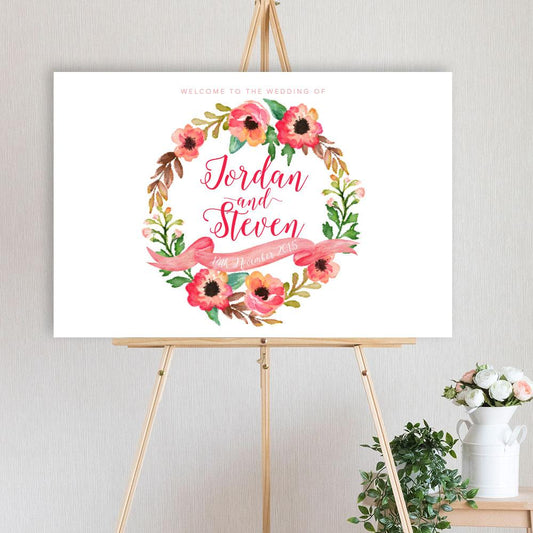 watercolour floral wreath designed welcome sign for wedding, engagement or birthday party, sitting on a timber easel